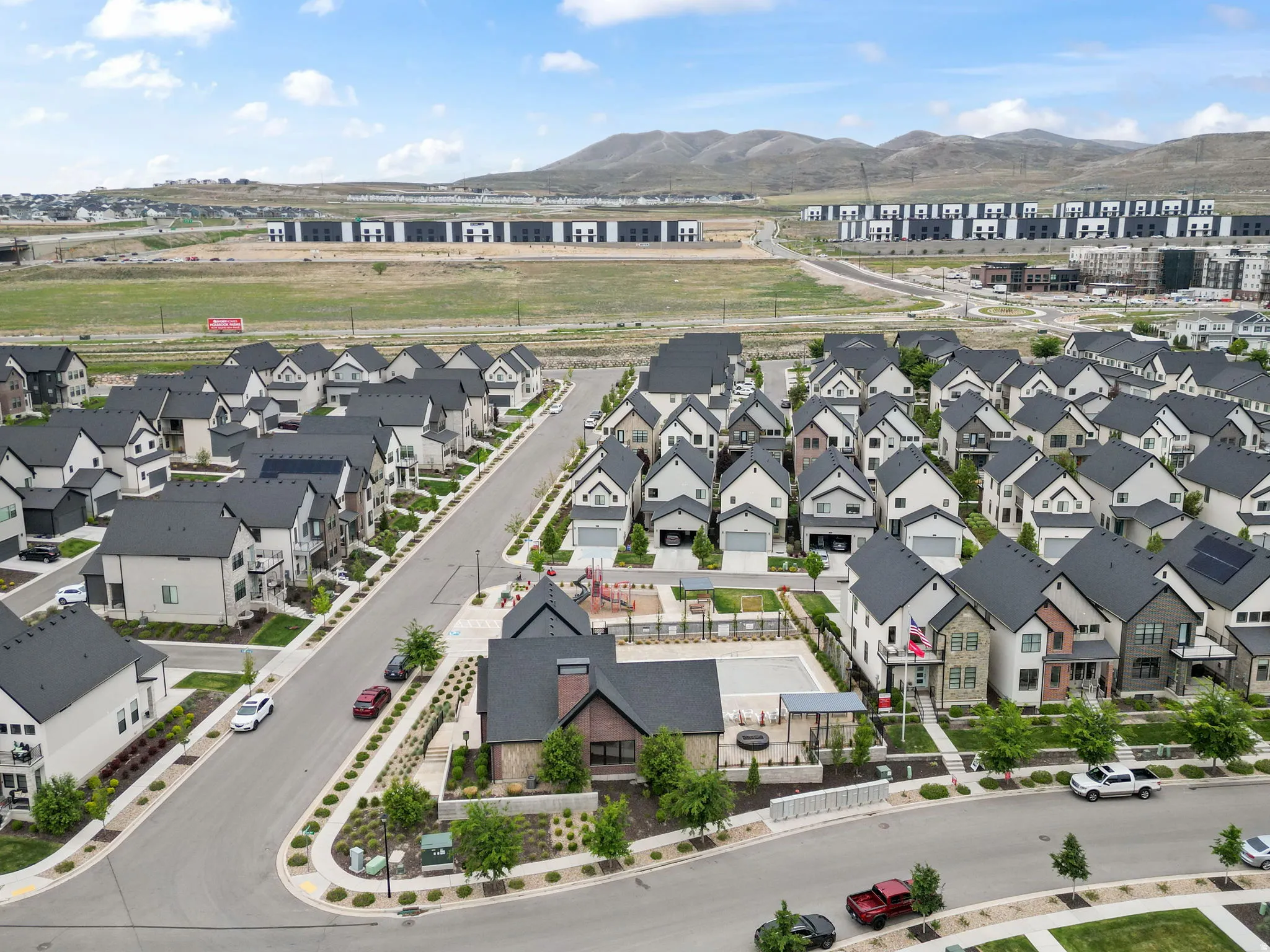 Aerial perspective showcasing a developed residential community with consistent architectural styling