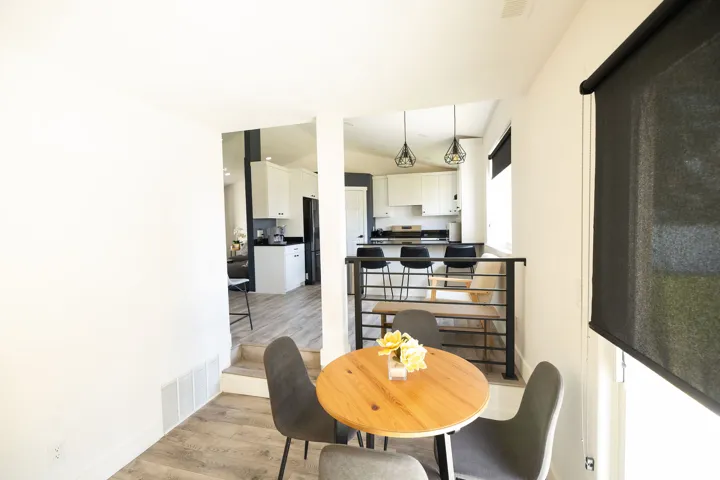 Dining space with light wood-style floors