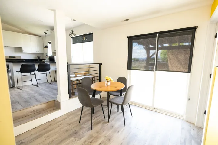 Dining space with light wood-style flooring