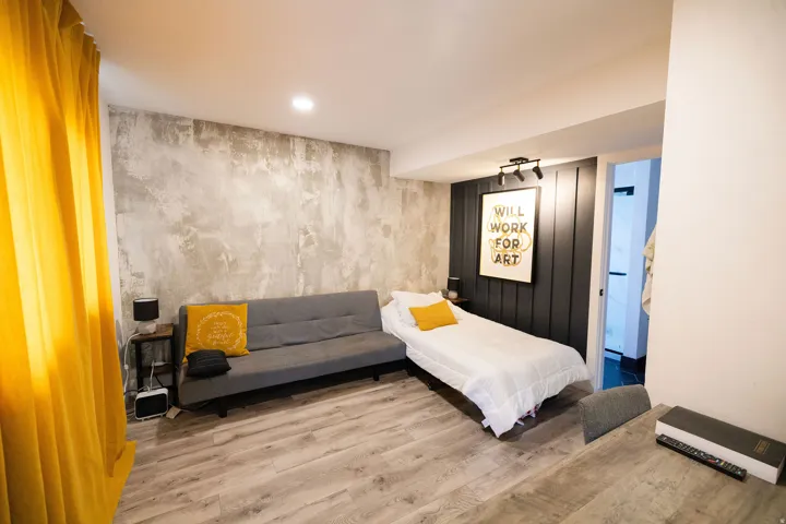 Bedroom featuring wood finished floors and recessed lighting