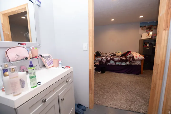 Bedroom featuring recessed lighting and carpet flooring