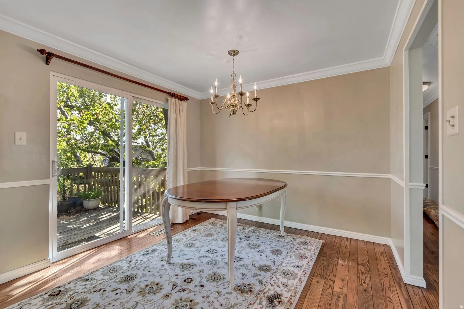 Sliding glass doors opening to an outdoor deck