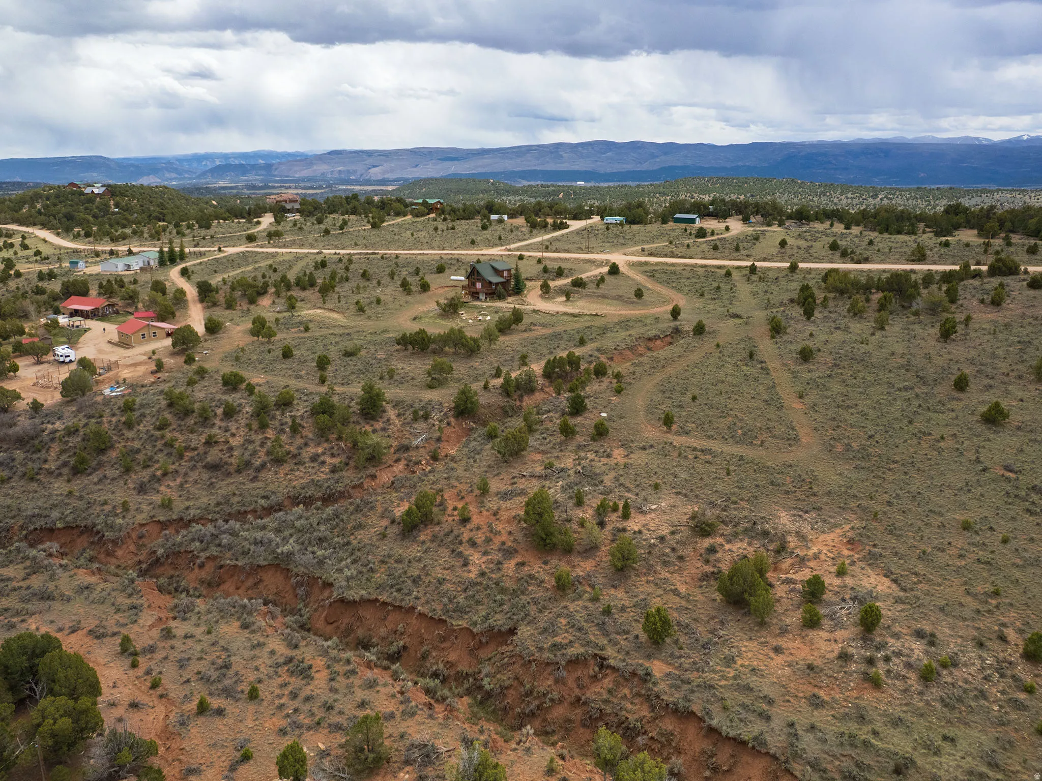 Overview of rural landscape with a mountain backdrop