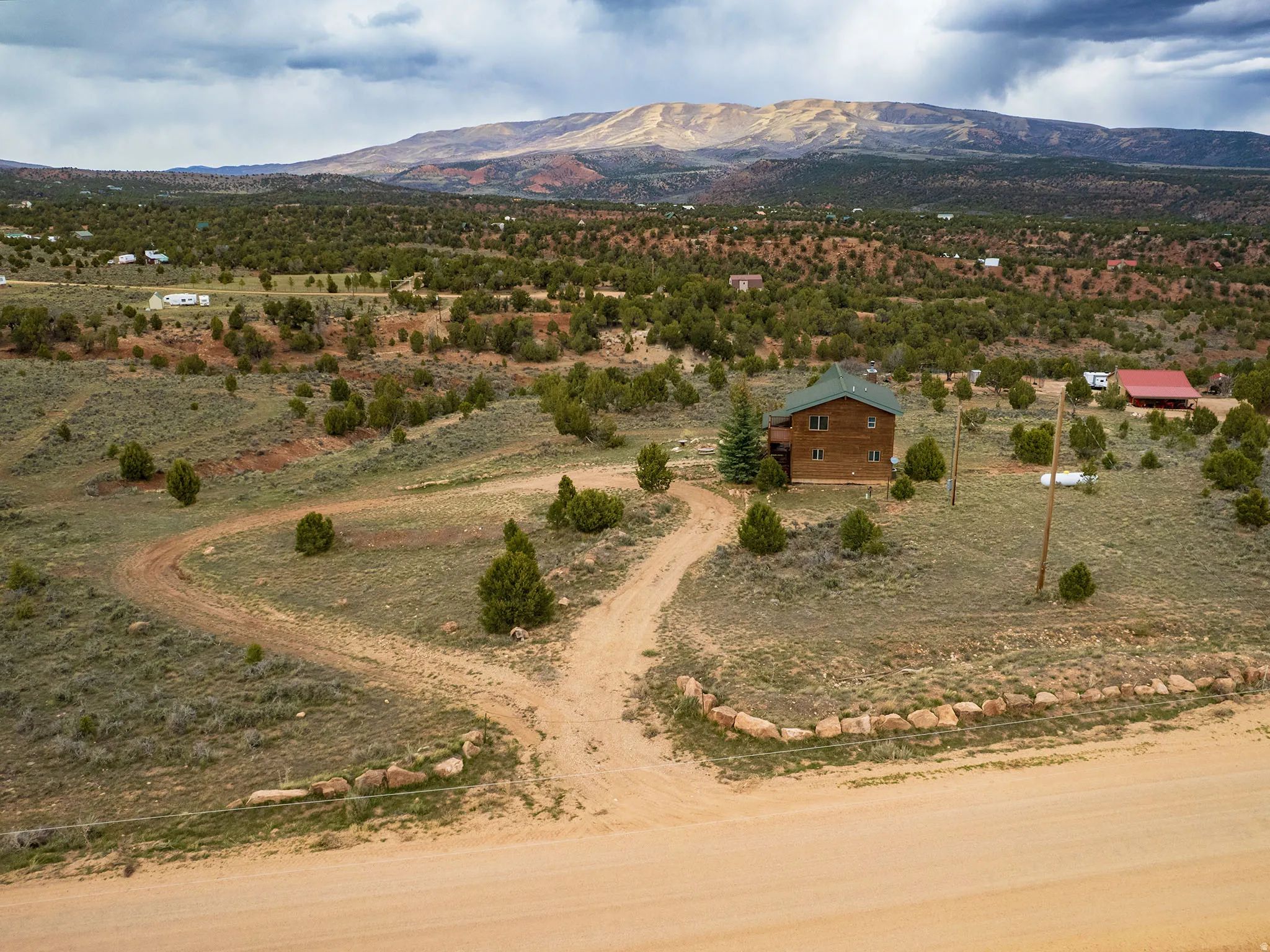 View of mountain background featuring rural landscape