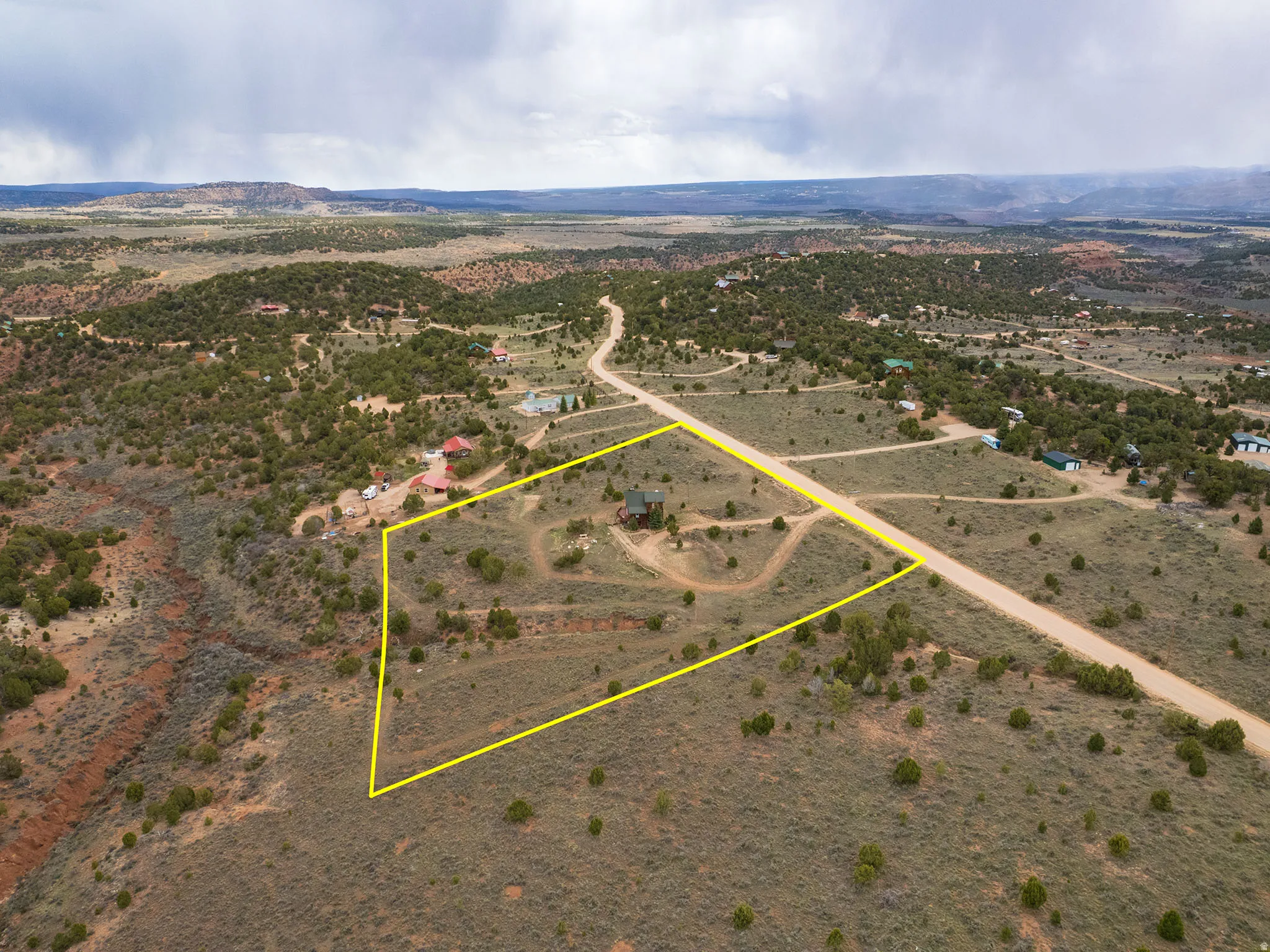 Overview of rural landscape with property boundaries highlighted and a desert landscape