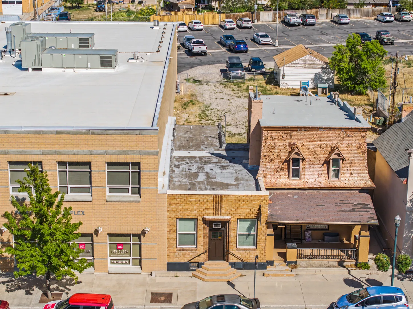 Historic brick facade with two dormer windows