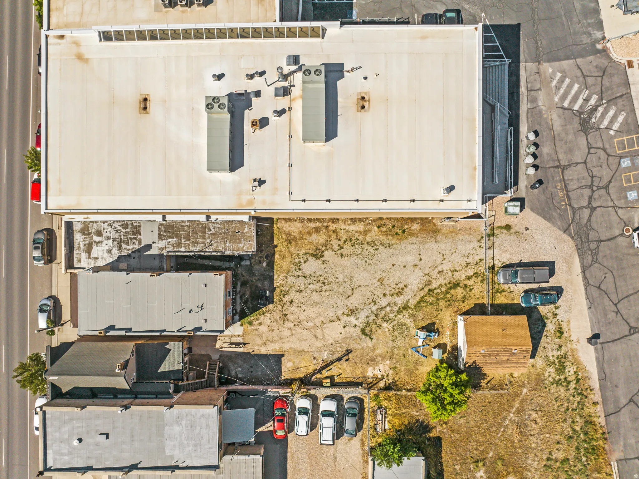 Extensive commercial property featuring multiple structures and substantial undeveloped land