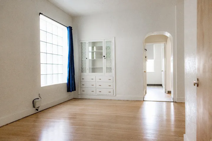 Hardwood flooring and textured walls define this interior space