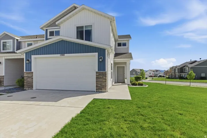 Contemporary exterior featuring blue vertical siding and light gray horizontal siding