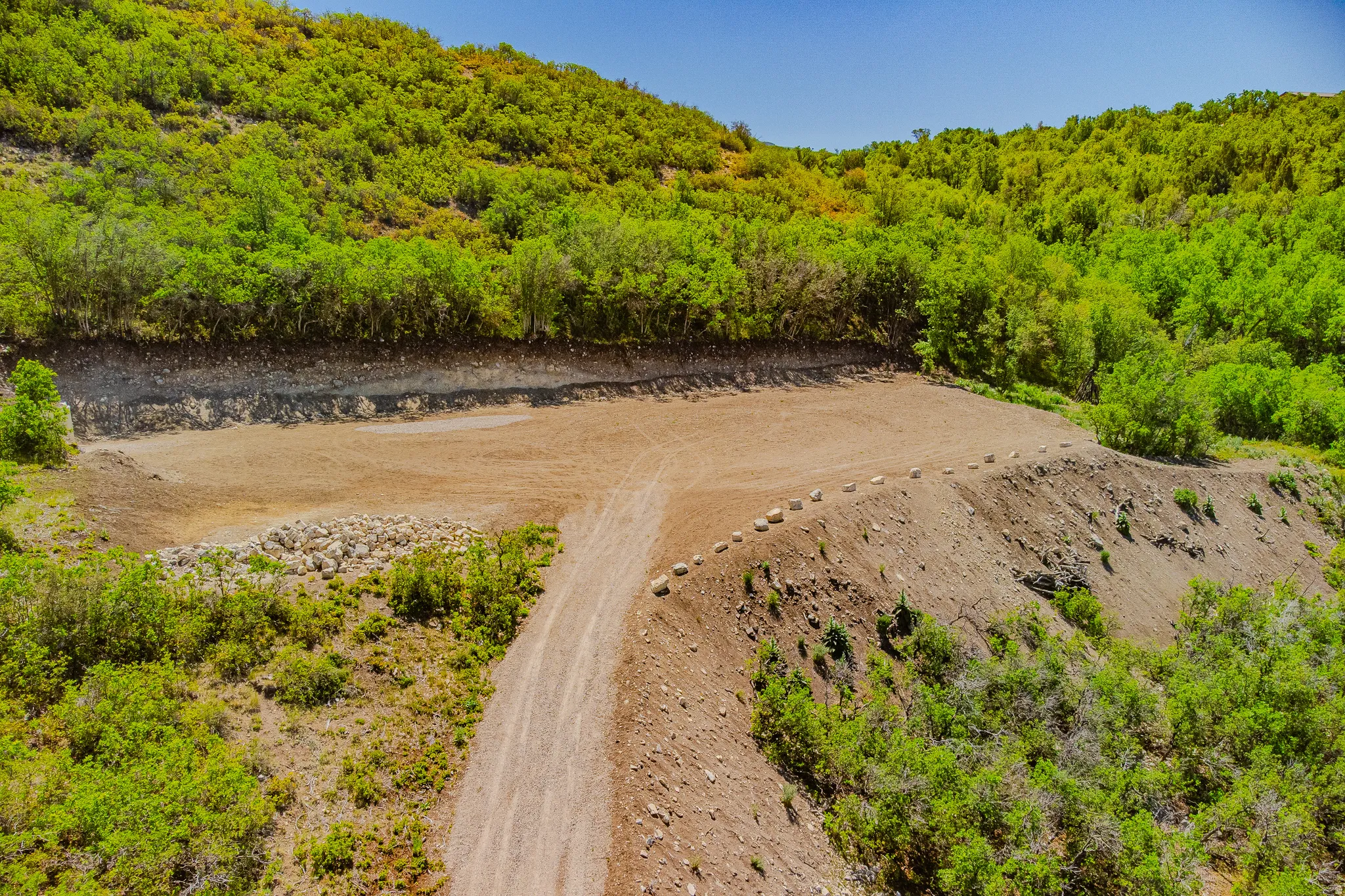 Cleared building site with an expansive flat pad