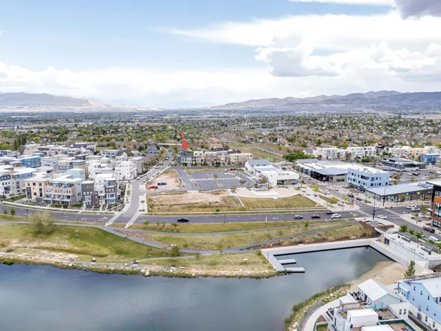 Expansive aerial perspective showcasing a master-planned community with waterfront access