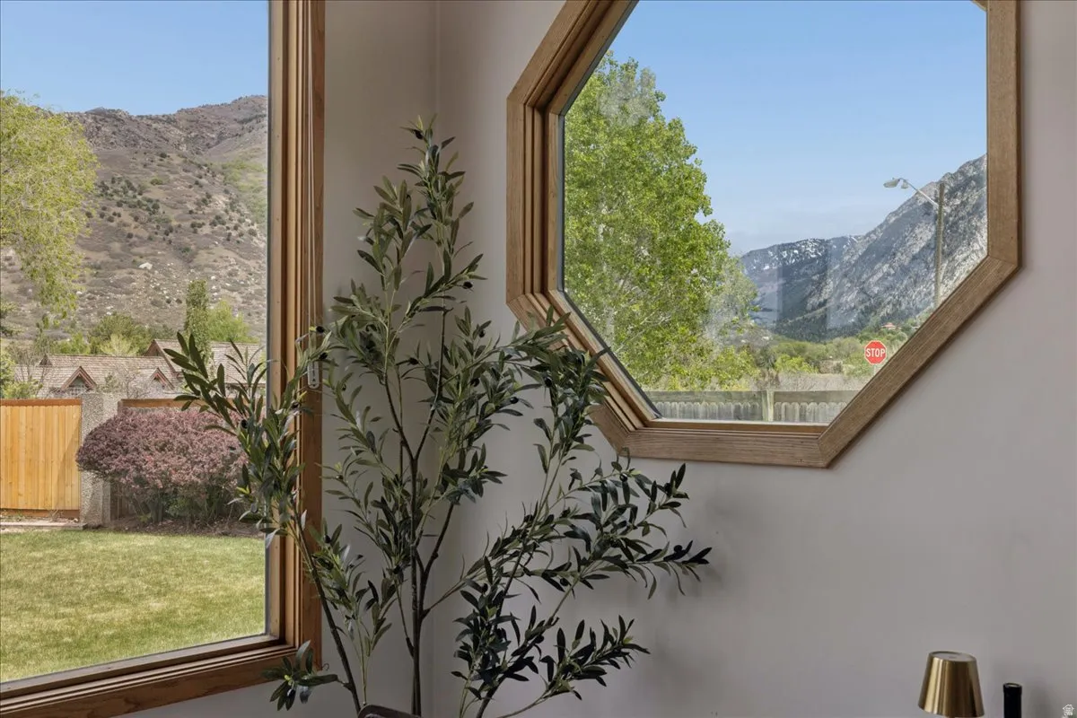 Corner windows with natural wood-finish trim