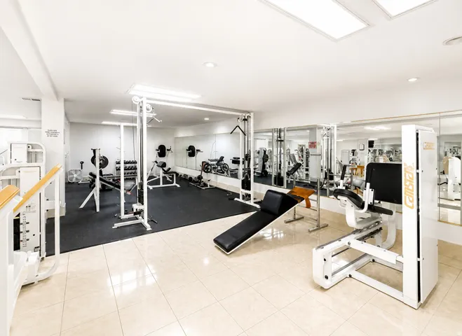 Dedicated fitness space featuring a variety of exercise equipment