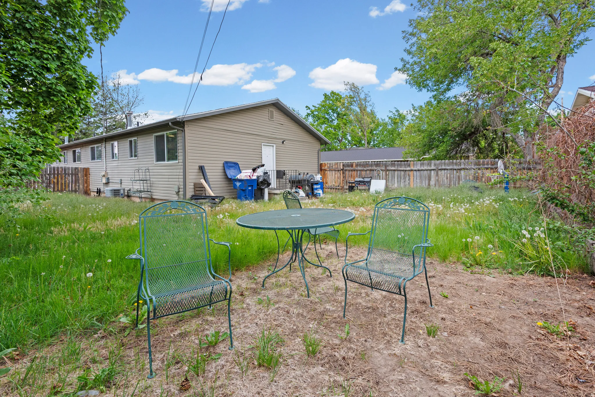 Expansive backyard with a full perimeter fence