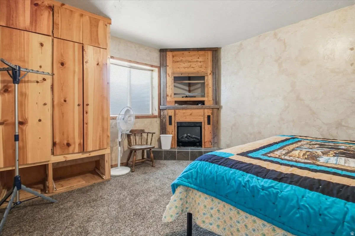 Wood-finish built-in wardrobe with integrated shelving