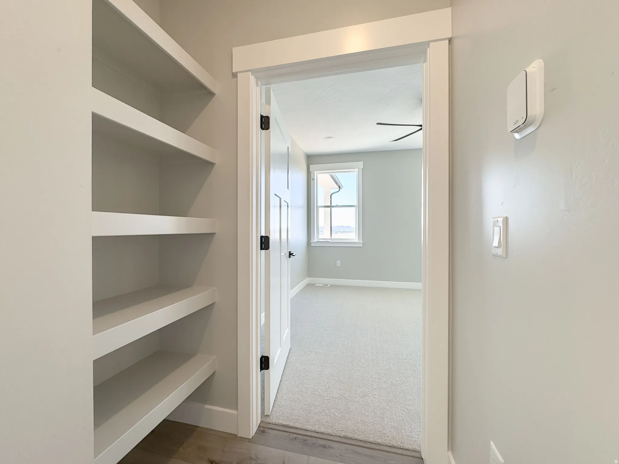 Built-in shelving unit featuring multiple open shelves
