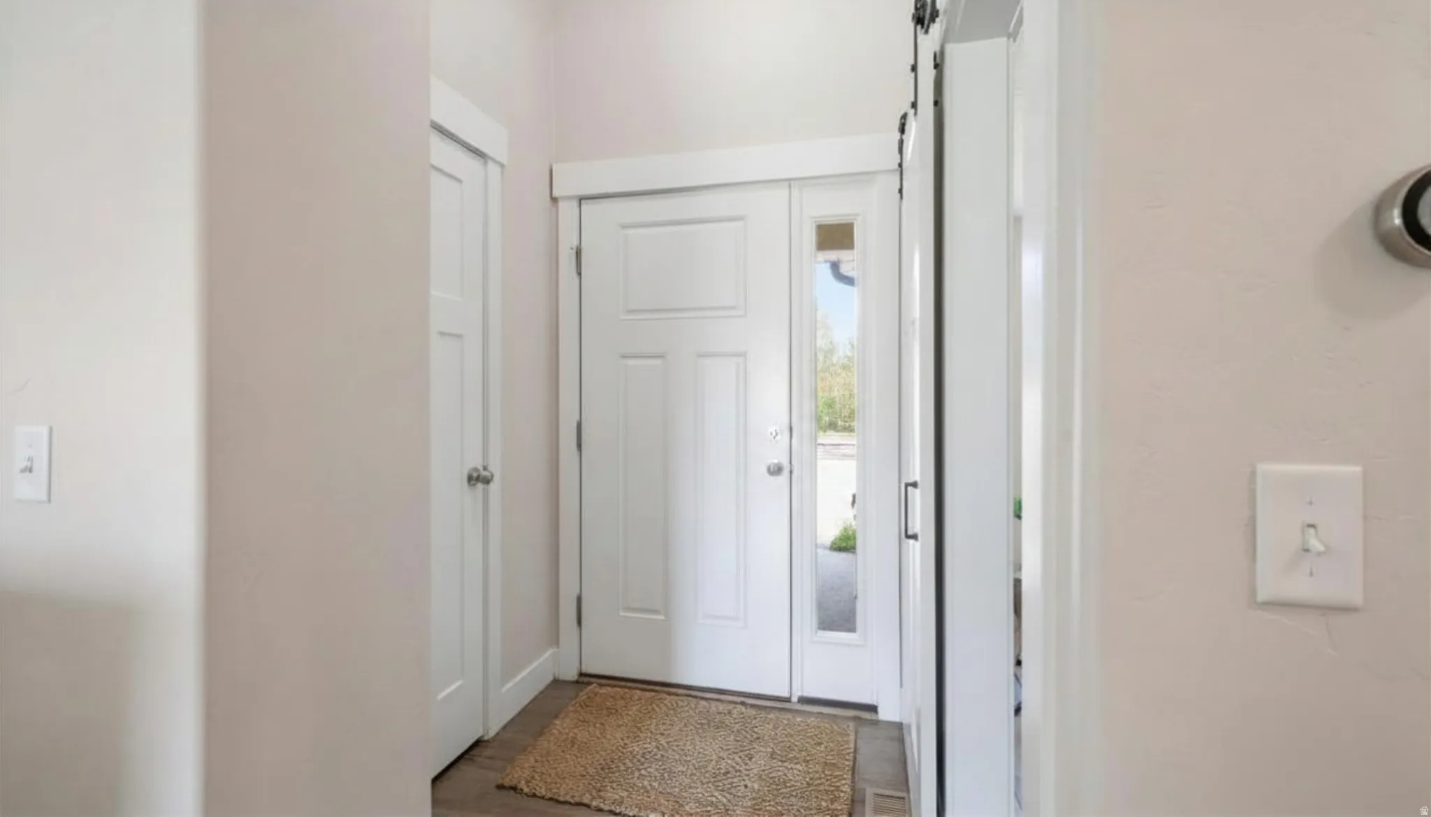 Entryway with closet and office access