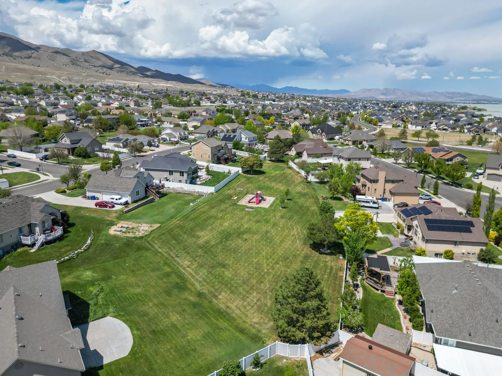 Aerial perspective of a community park with playground