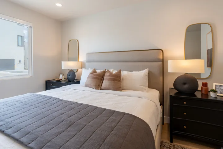 Neutral wall paint complements the window with white trim