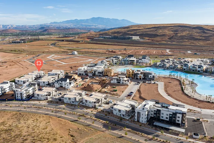 Residential area featuring a large, blue man-made lagoon