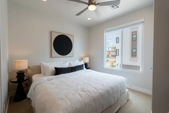 Bright interior space with carpeted flooring