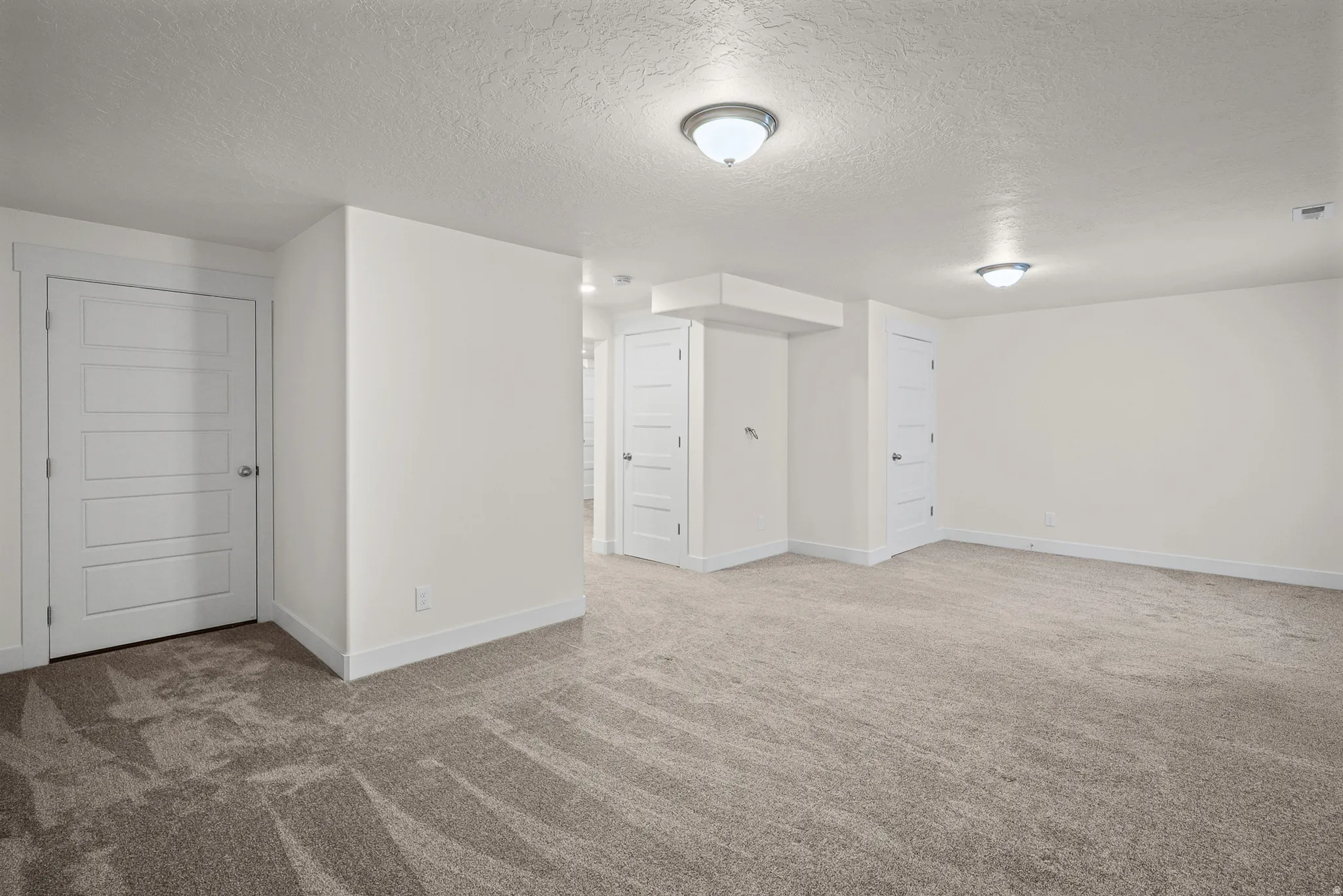 Newly finished basement in 2024. Could be used as a bedroom or office. There is a door that separates the basement from the 1st floor. Or be used as a living room. Or be used as a living room/
