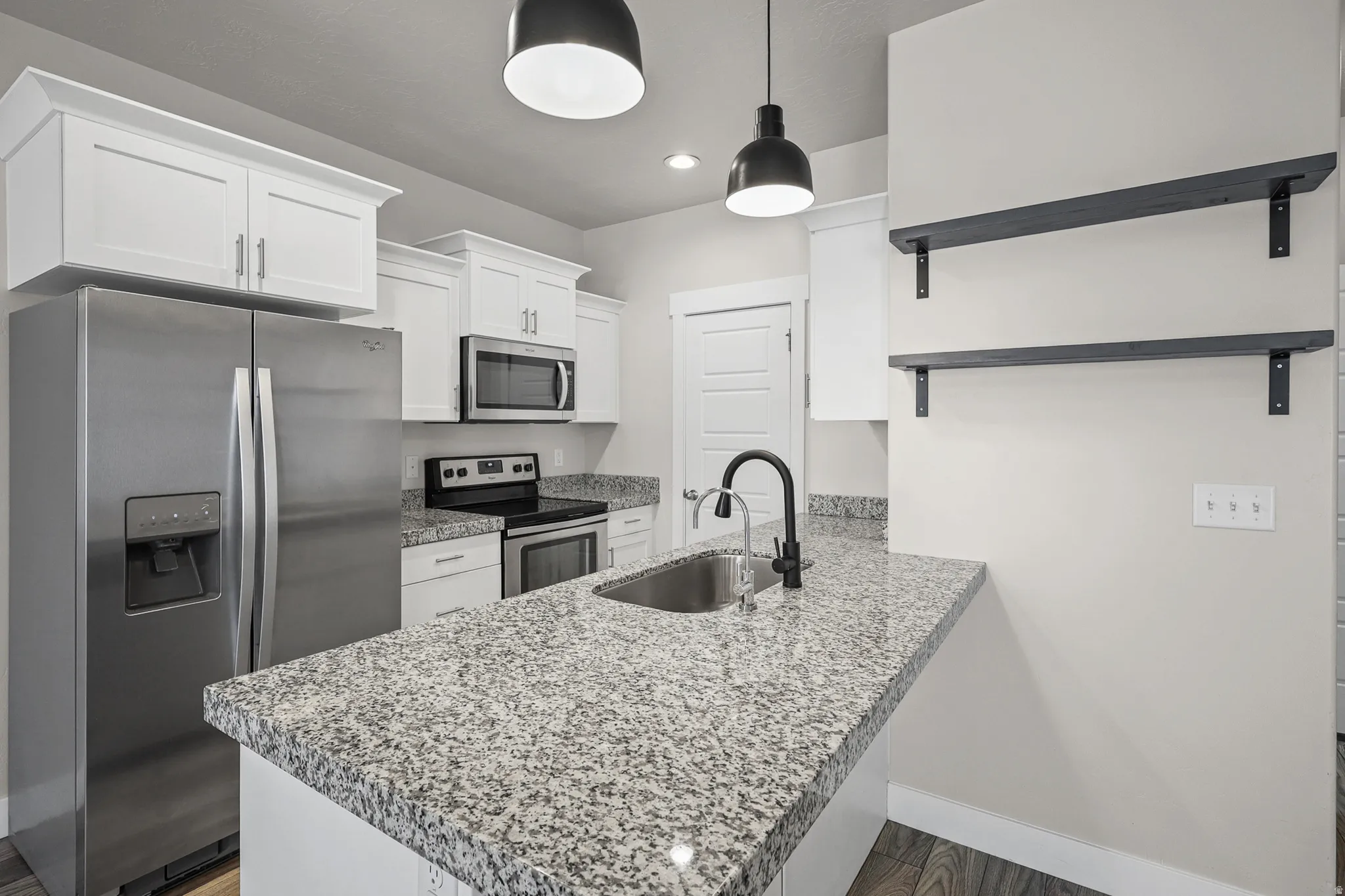 Kitchen featuring all included appliances