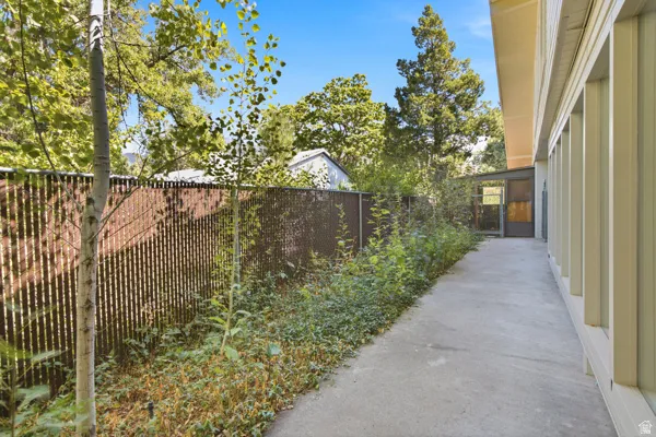 Concrete walkway alongside the structure