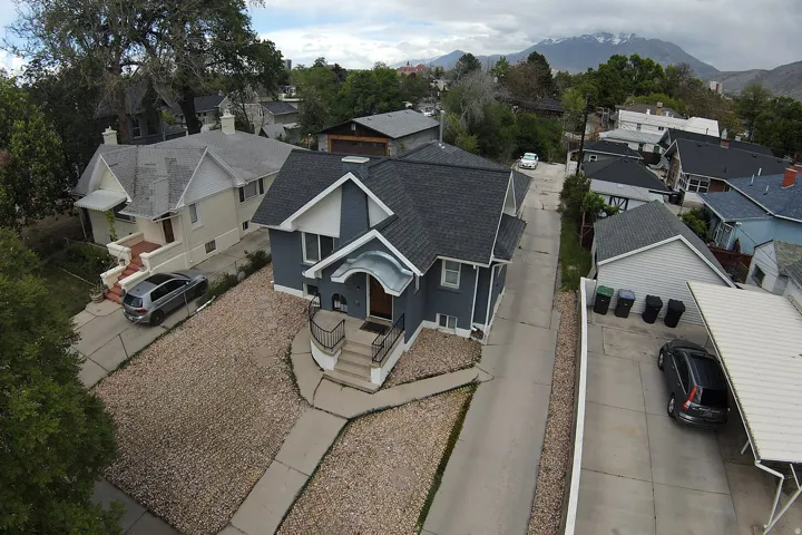 Aerial view of residential area with a mountain backdrop