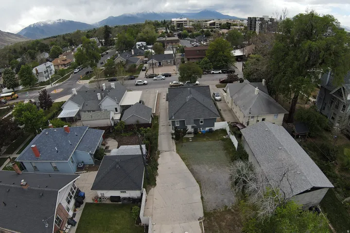 Aerial view of residential area with a mountain backdrop
