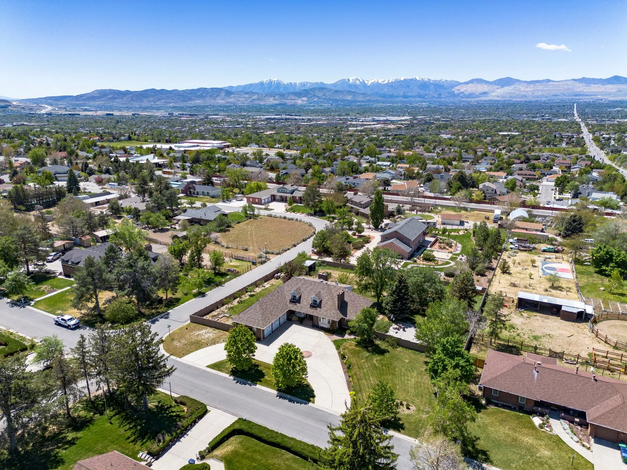 Expansive suburban setting with a mountain range backdrop
