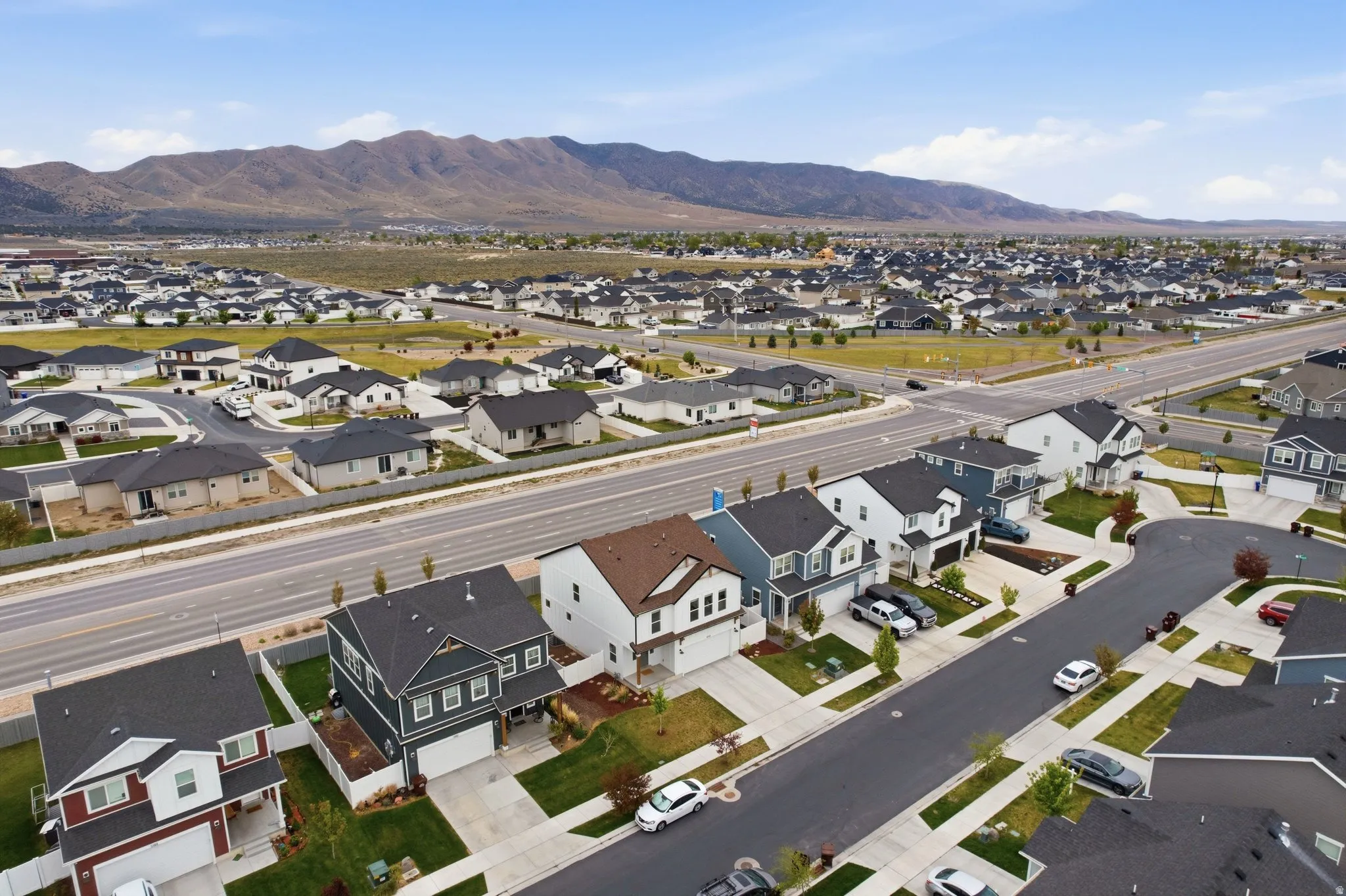 Expansive residential area with a prominent mountain range backdrop