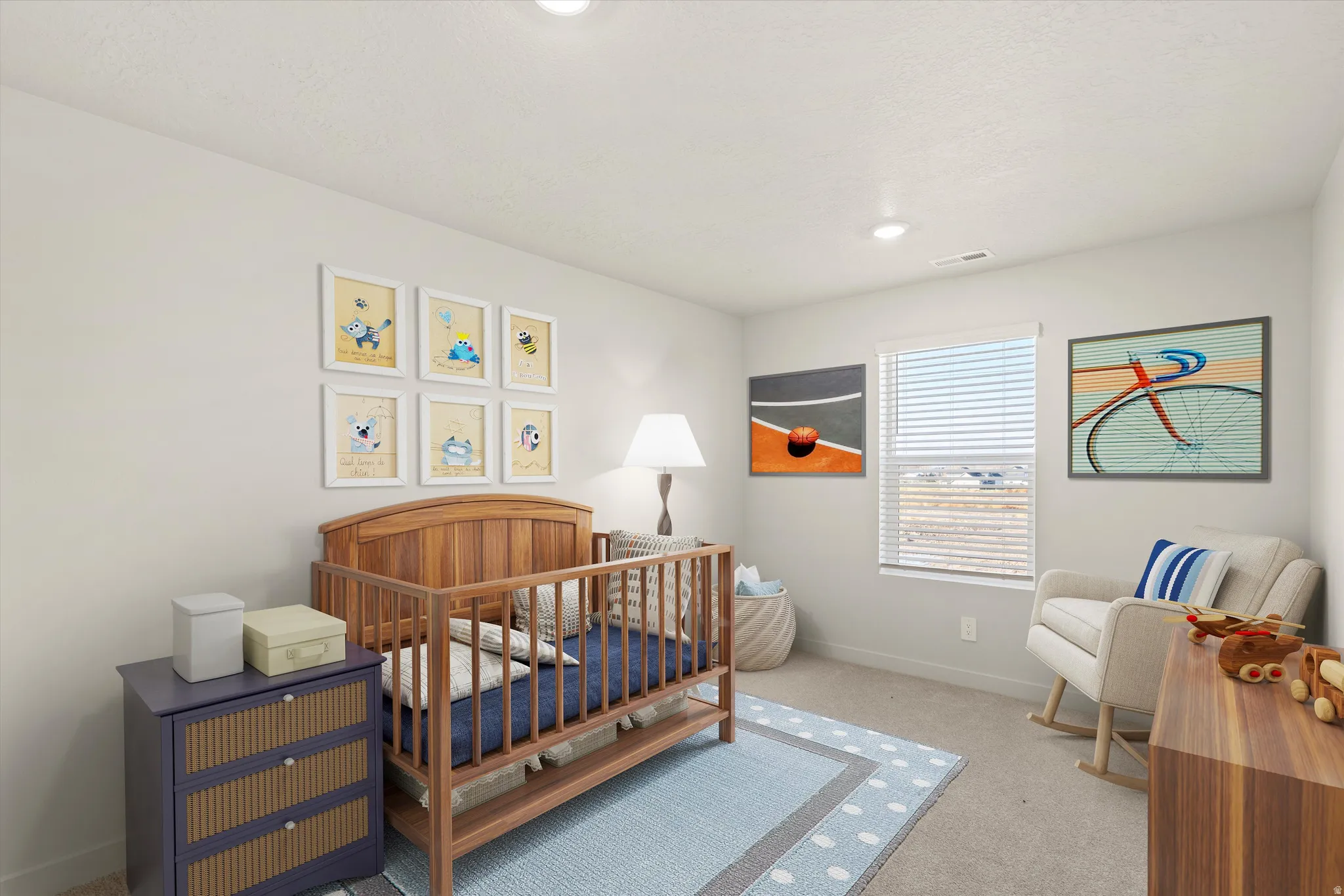 Bedroom featuring light-toned walls and carpet flooring