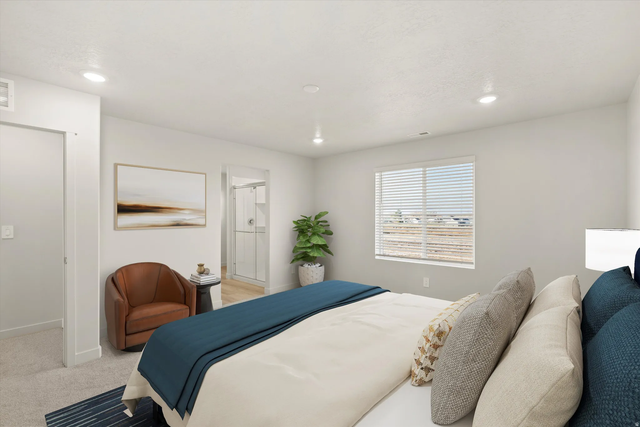 Expansive room featuring recessed lighting and a large window with horizontal blinds