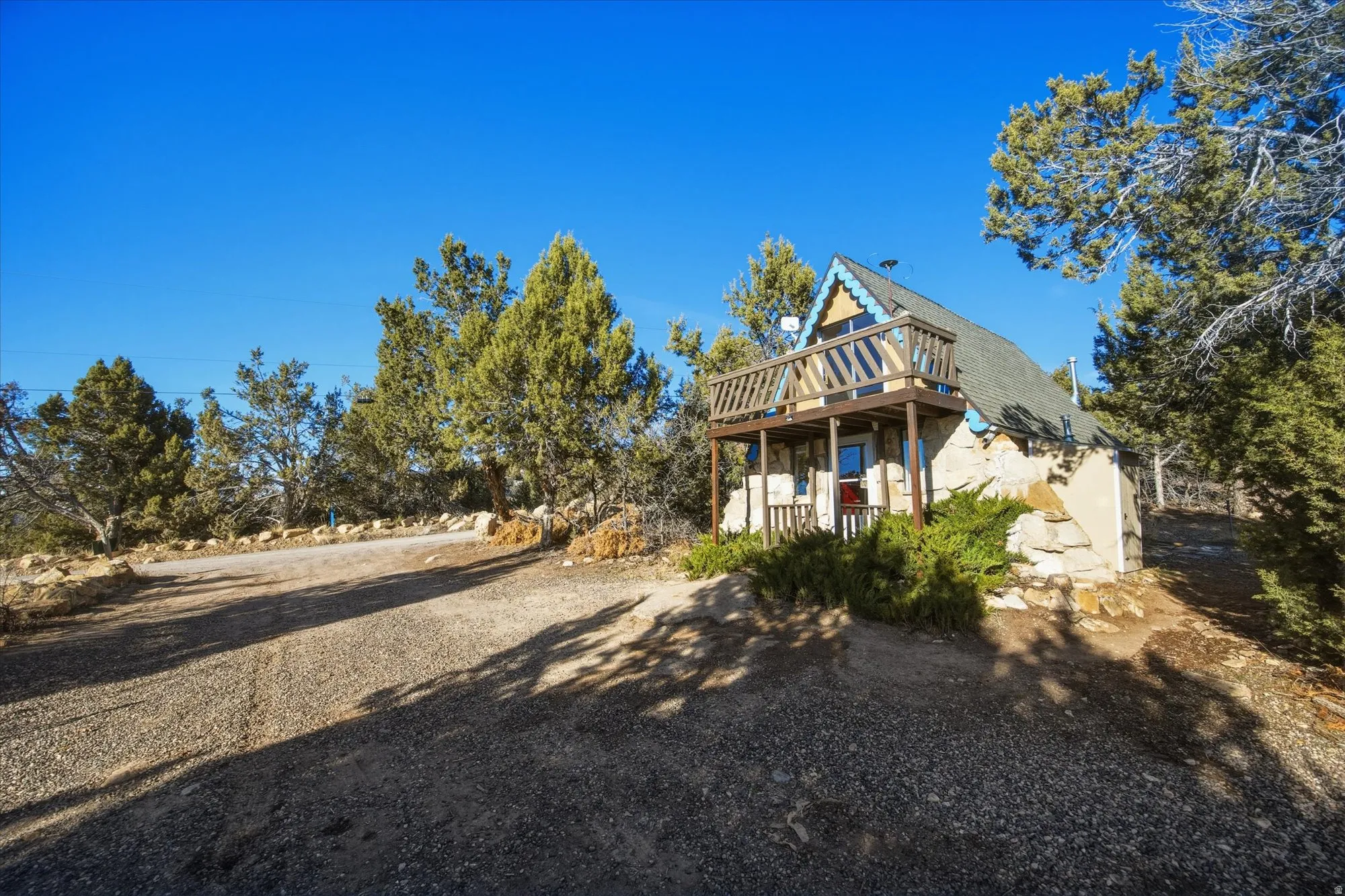 Rear view of property with a deck