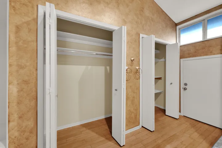 Multiple bi-fold door closets providing ample storage