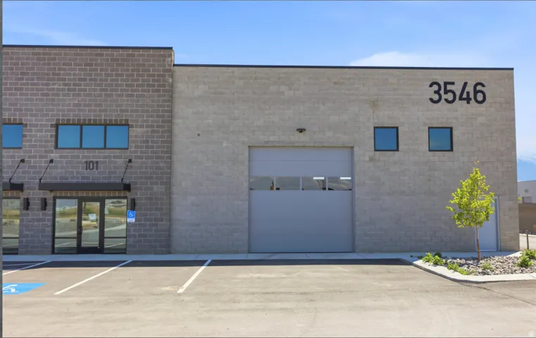 Commercial building exterior featuring two distinct block masonry finishes