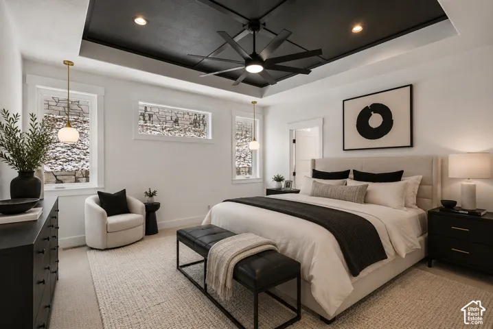 Recessed tray ceiling with dark paint finish and ceiling fan