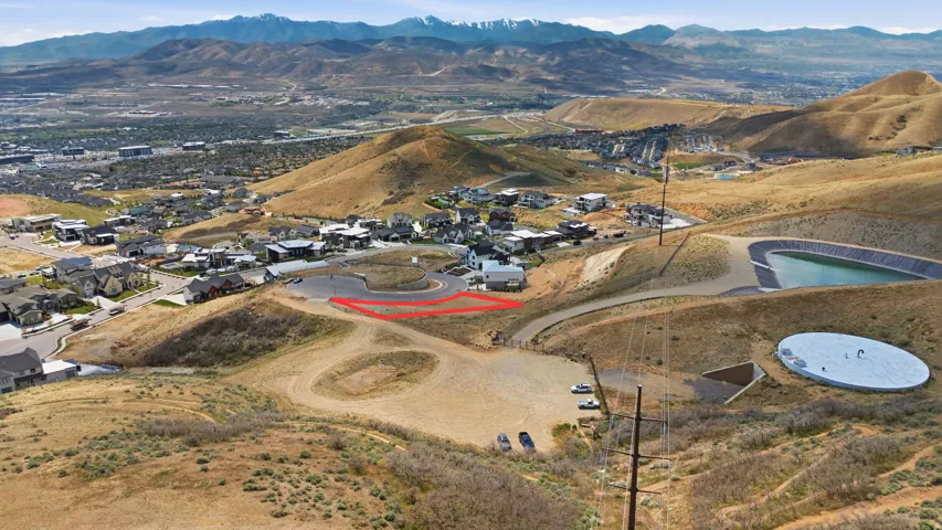 Expansive buildable lot outlined in red, set within a developed residential area