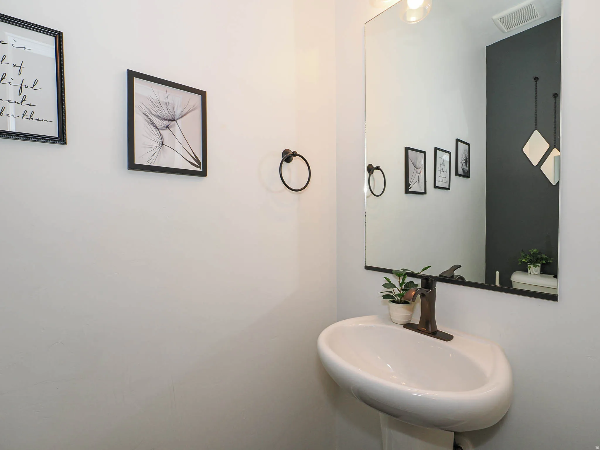 Half bathroom with a sink