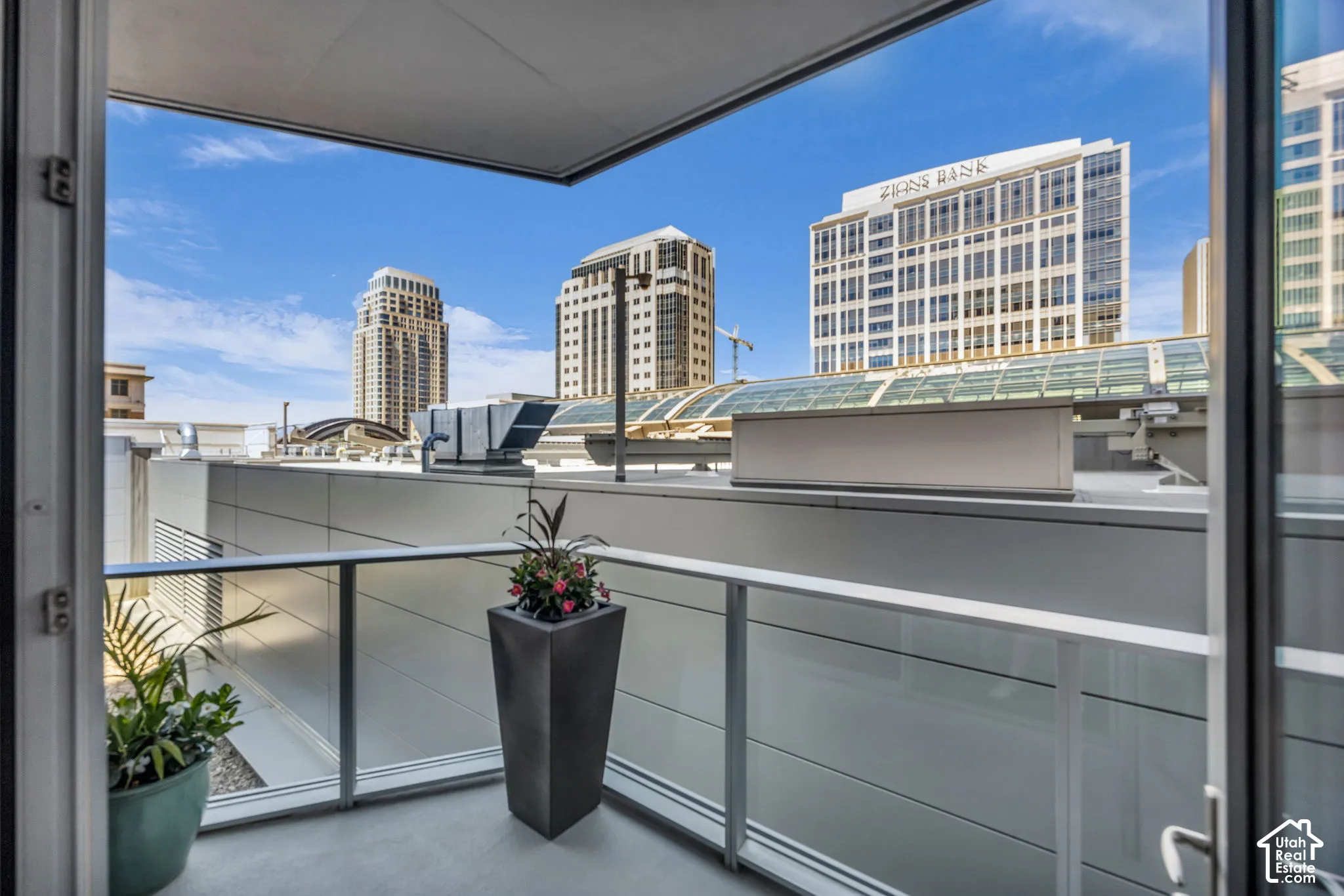 Balcony featuring a view of city