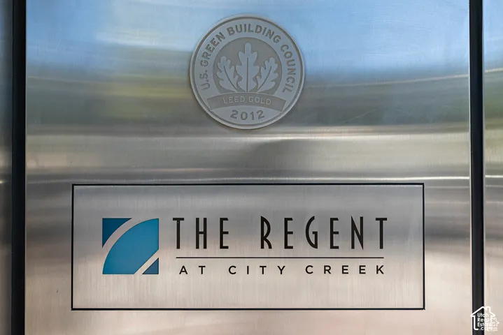 Brushed metal architectural signage featuring "The Regent at City Creek" branding and a LEED Gold 2012 certification from the U.S