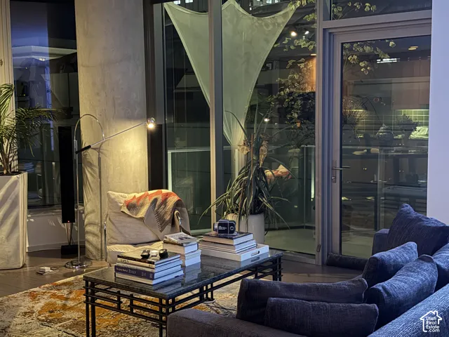Floor-to-ceiling windows with a glass-paned door