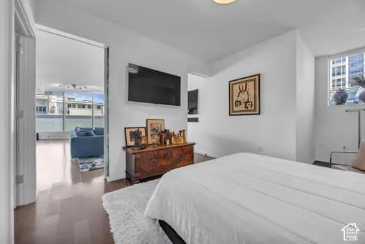 Bedroom featuring dark wood finished floors