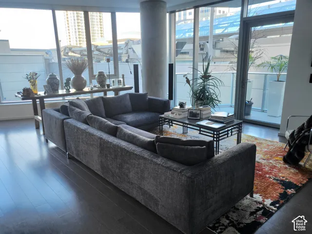 Living area featuring healthy amount of natural light and wood finished floors