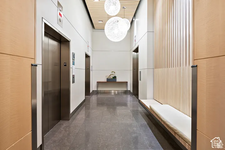 Modern lobby with two stainless steel elevators