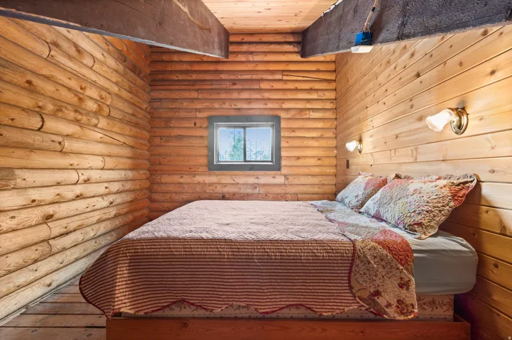 Interior space featuring natural wood walls and ceiling