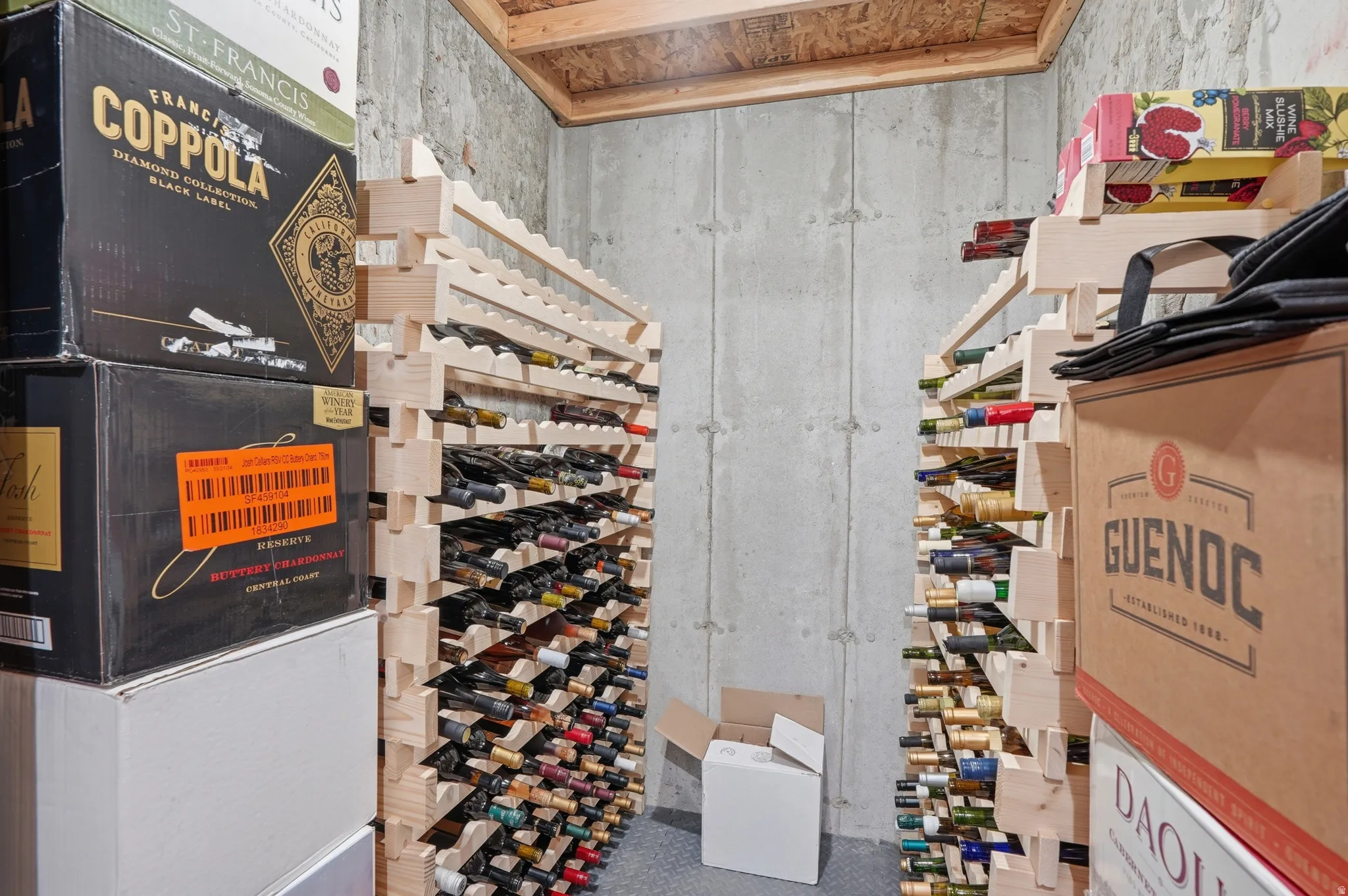 Dedicated storage room featuring concrete walls