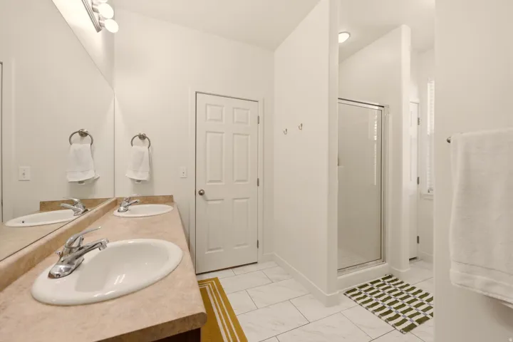 Dual vanity with undermount sinks and chrome fixtures