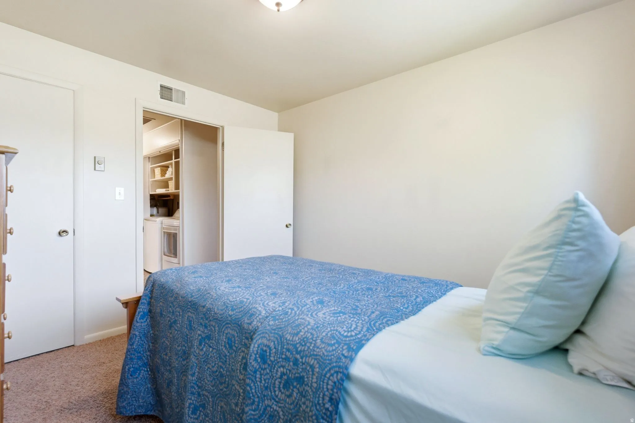 Bedroom featuring carpet flooring and white walls